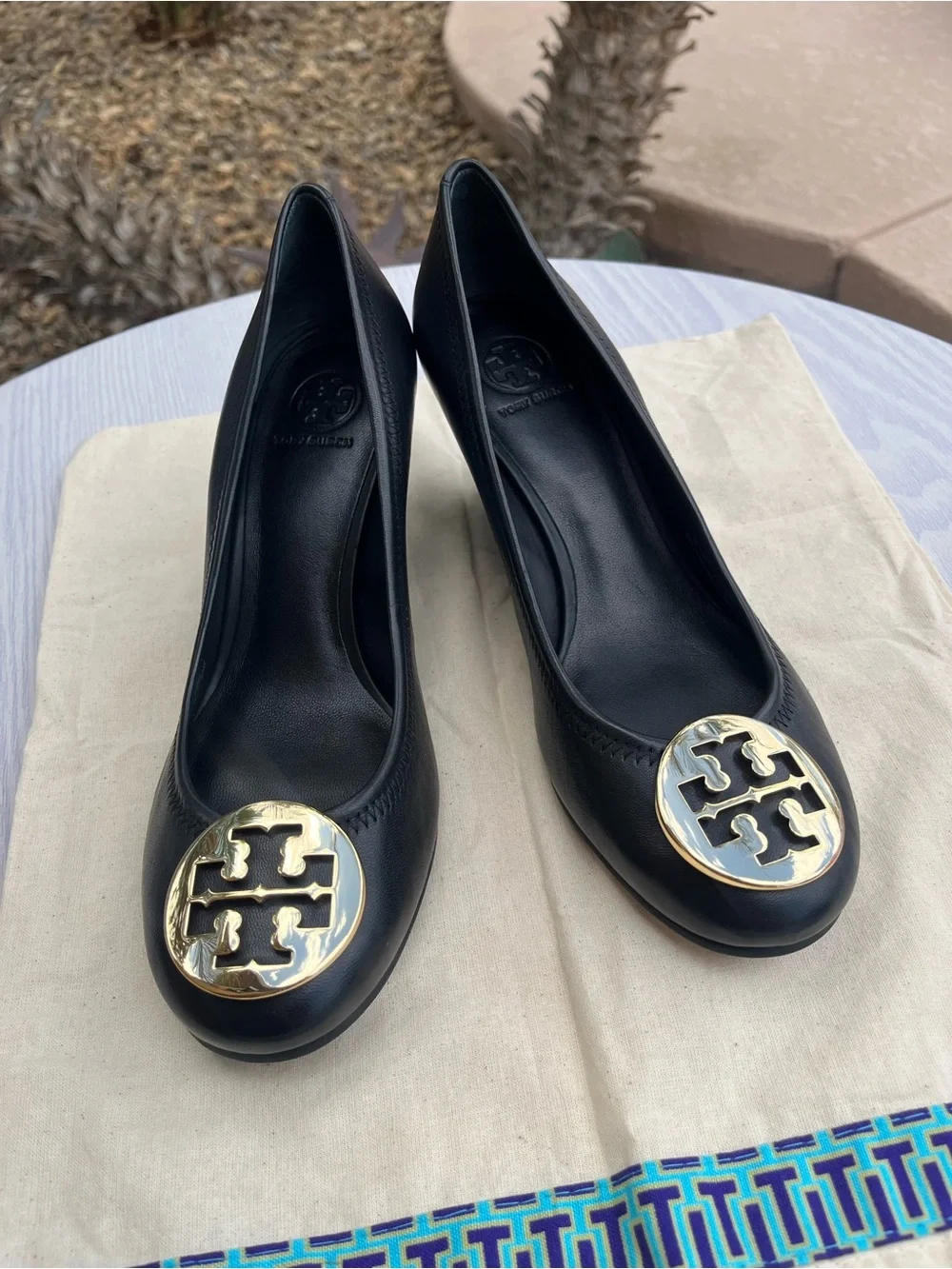 Tory Burch Sally Black Leather Wedge Pumps with Gold Medallion